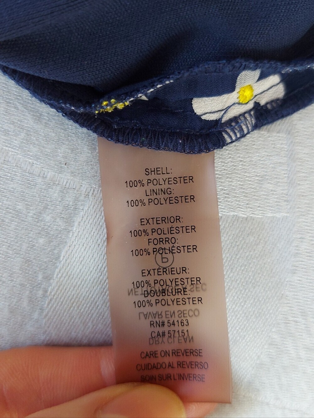 KARL LAGERFELD size 10 Navy Top with White Daisy Details and Yellow Centers - Picture 4 of 8